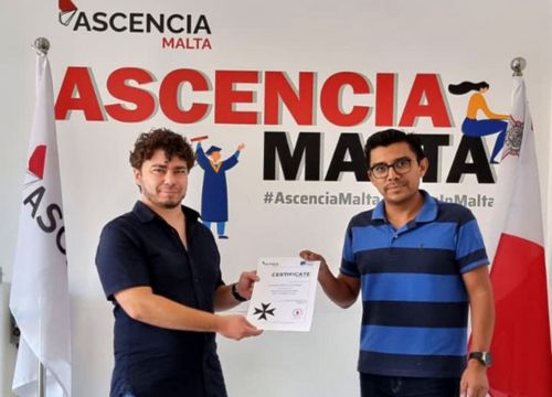 Student receiving Business English certificate at Ascencia Malta