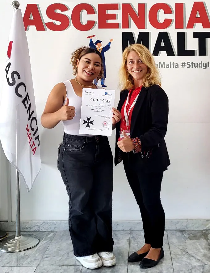 Student Maria Joana receiving English course certificate at Ascencia Malta study in Malta program