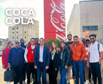 Ascencia Malta students visiting the Coca-Cola facility in Malta
