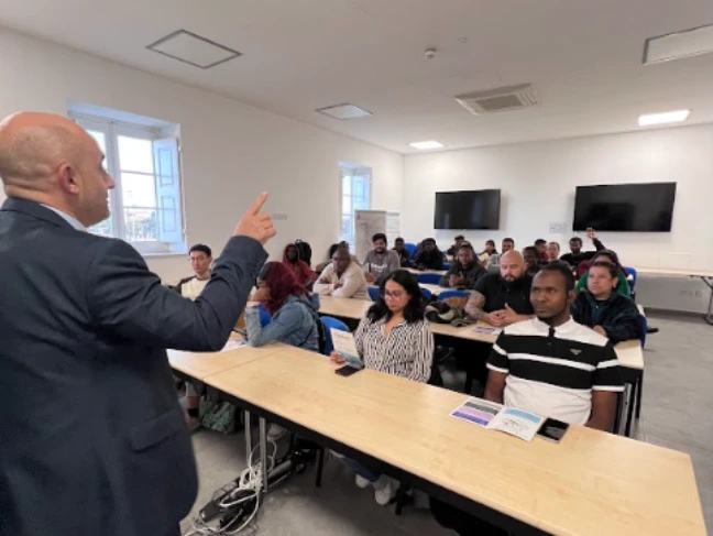 Lecturer delivering a classroom session to students at Ascencia Malta