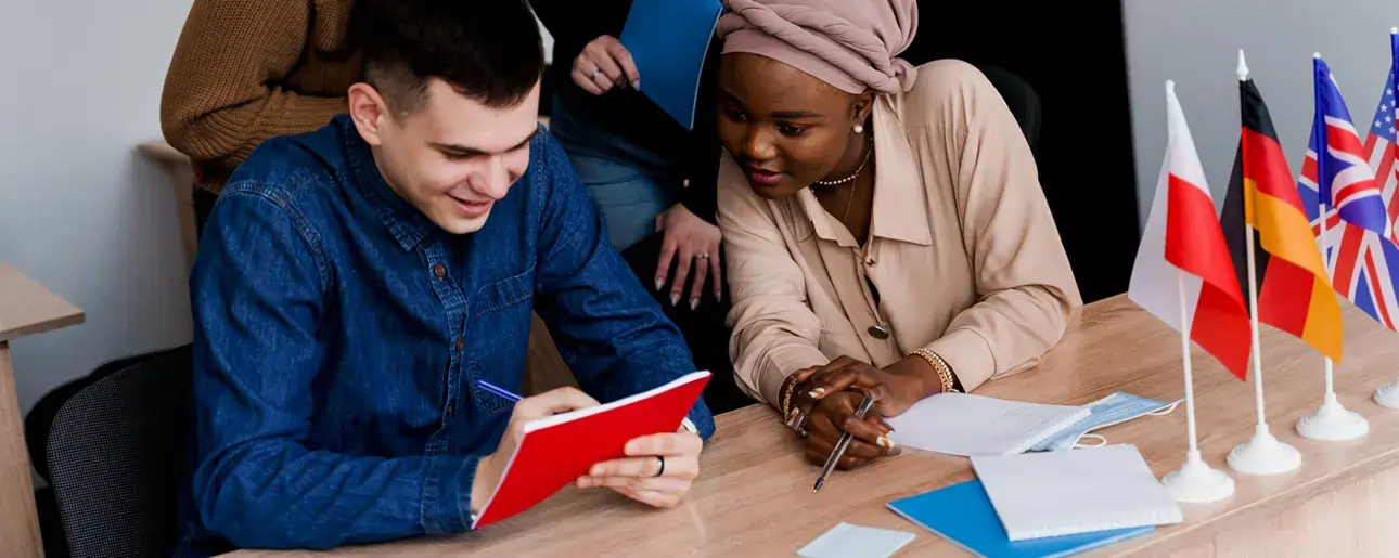 Students preparing for the IELTS exam in a collaborative classroom at Ascencia Malta, building English language skills for study, work, and migration opportunities