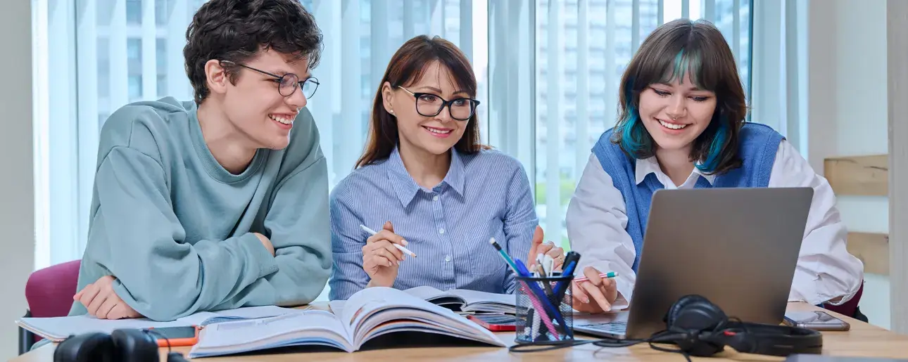 Students studying with an instructor during an Ascencia Malta CAE (Cambridge Advanced English) preparation course, developing advanced English language and communication skills.