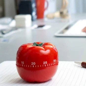Pomodoro Technique timer on a study desk promoting effective time management and student productivity