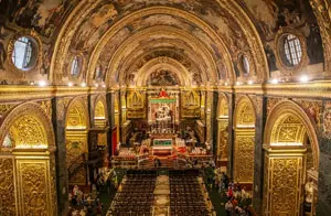 Ornate Baroque interior of St John's Co-Cathedral in Valletta, Malta.